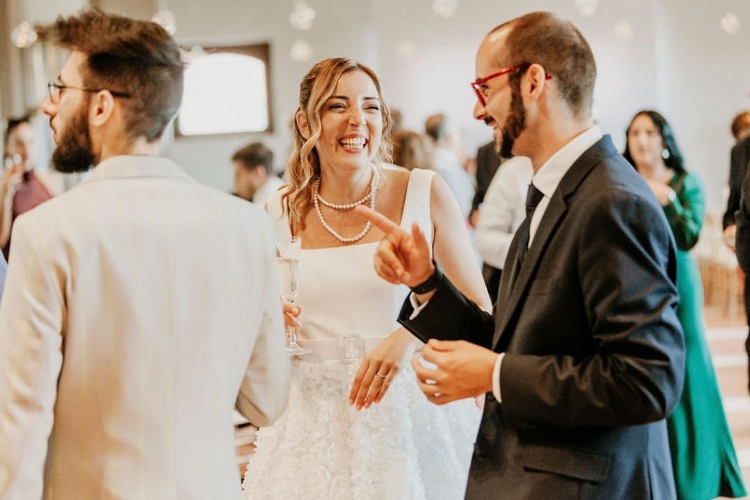 Daniele La Brecciosa sharing a moment with a bride at Villa Corallo.